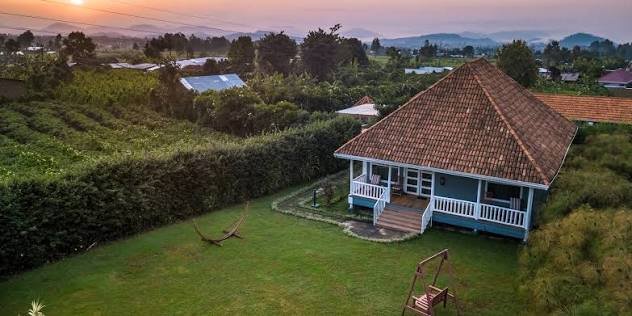 Five Volcanoes Boutique Hotel enjoys an outstanding location in Musanze District, Rwanda's tourism capital and the primary gateway to Volcanoes National Park. Situated approximately two and a half hours by road from Kigali International Airport, the hotel offers visitors convenient access to Rwanda's most famous wildlife destination while remaining easily accessible from the country's capital.