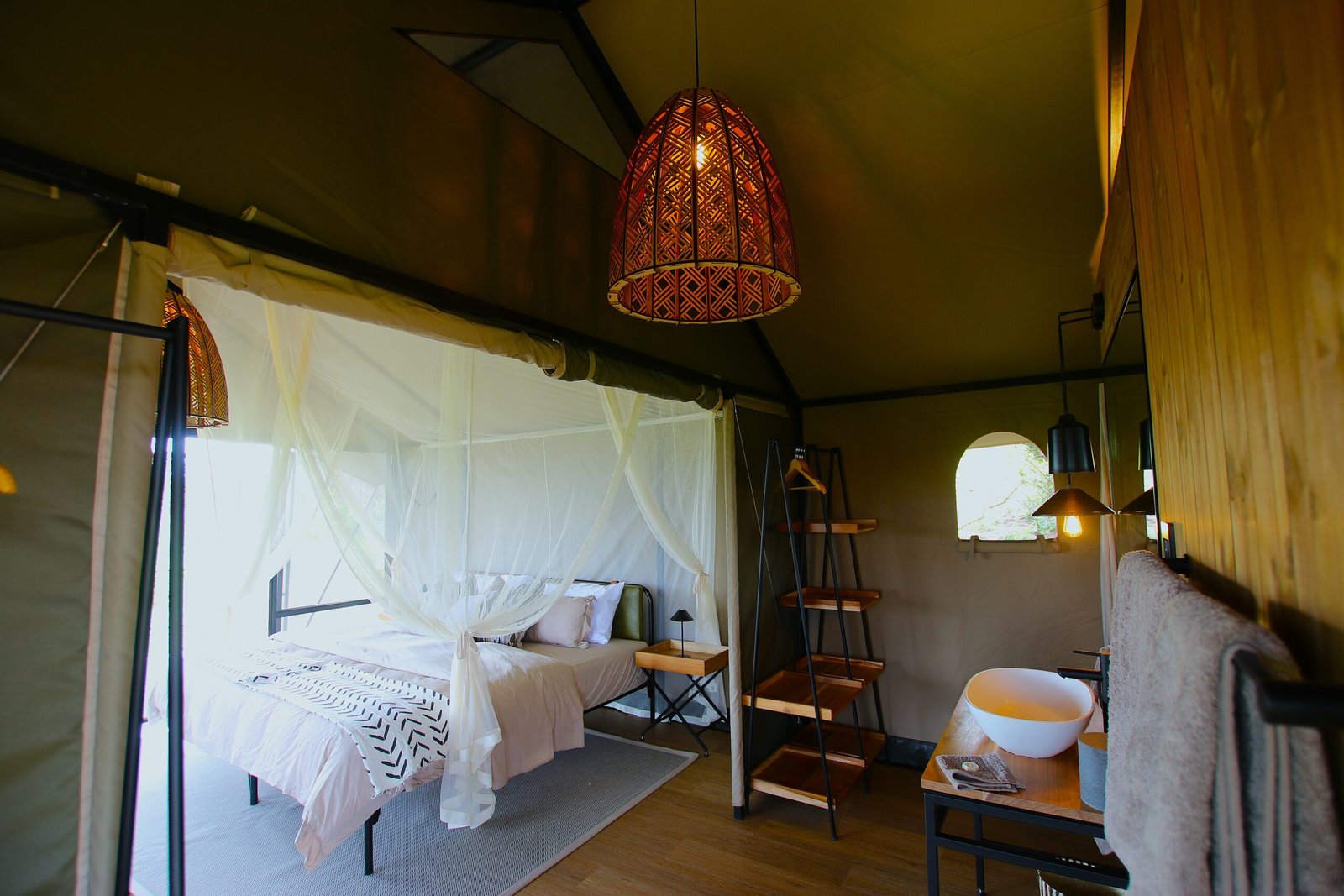 Accommodation at Karenge Bush Camp perfectly balances authentic wilderness adventure with comfortable safari living. Designed to immerse guests in nature without sacrificing essential comforts, the camp's luxury safari tents provide peaceful retreats after exciting days exploring Akagera National Park.