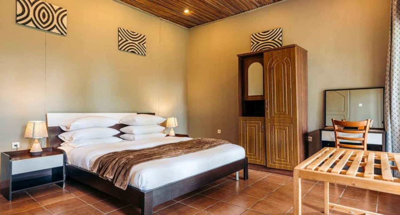 Accommodation at Nyungwe Top View Hill Hotel has been carefully designed to provide guests with comfort, privacy, and breathtaking views while maintaining a peaceful atmosphere that perfectly complements the surrounding rainforest environment. Whether visiting for chimpanzee trekking, birdwatching, business, photography, or relaxation, every guest enjoys spacious accommodation equipped with modern amenities and exceptional hospitality.
