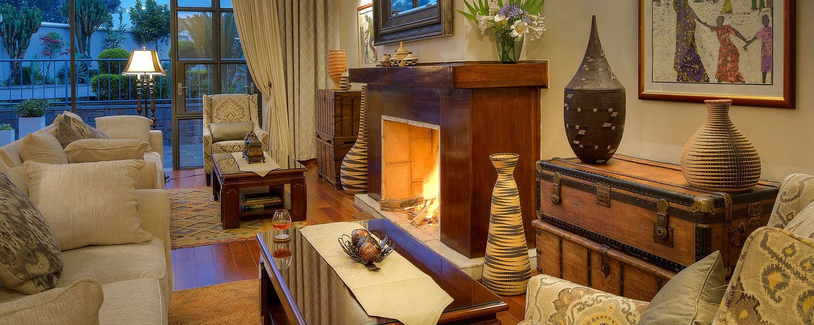 The architecture of The Bishop's House beautifully combines timeless European elegance with the warmth, craftsmanship, and natural beauty of Rwanda. Inspired by the character of a traditional bishop's residence, the property has been thoughtfully designed to create an atmosphere of refined sophistication while remaining perfectly integrated into the surrounding volcanic landscape.